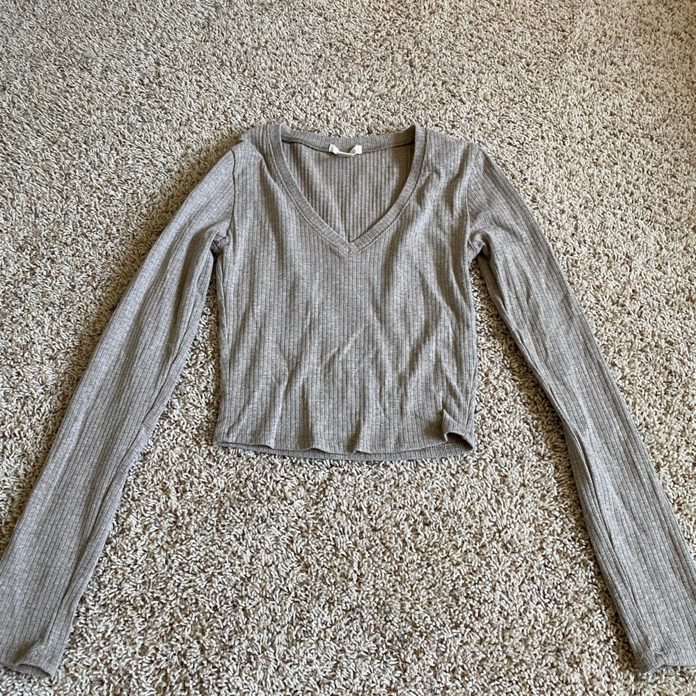 light brown long sleeve, a little bit cropped